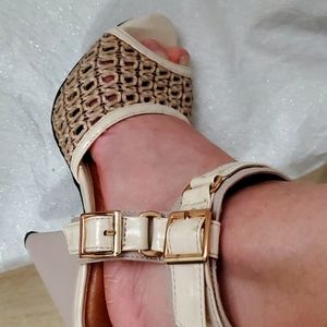 Beige heels with a ankle wrap